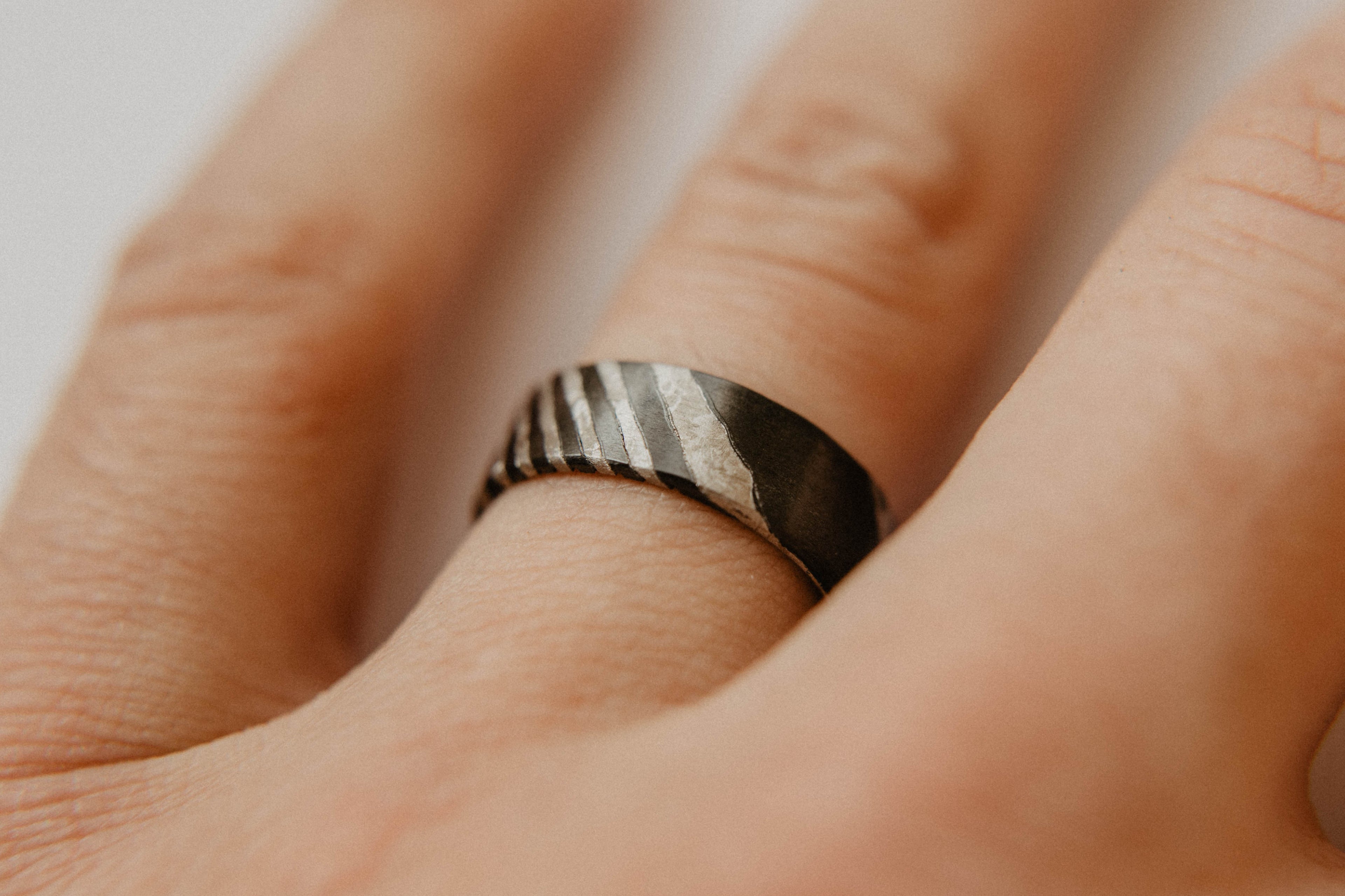 Zirconium and Crystallized Titanium Wedding Band (Shown on finger)