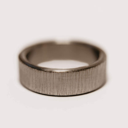 Vertical Grain Titanium wedding band. This photo shows a vertical grain gray titanium ring. (Horizontal with white background)