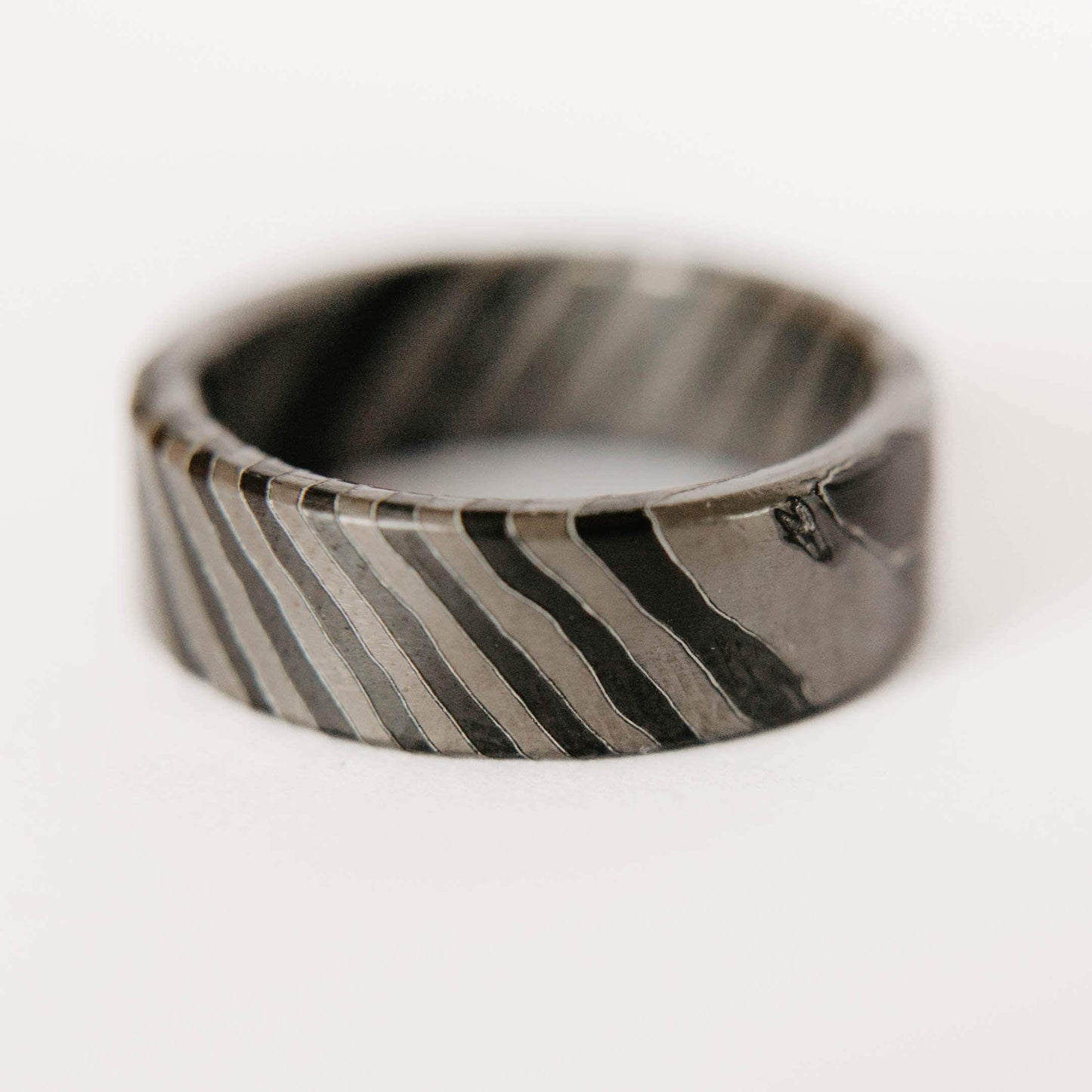 Black Zirconium and Titanium Damascus Wedding Band