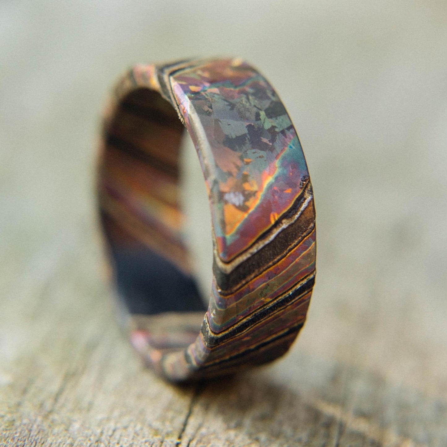 Iridescent Flame Anodized Crystallized Titanium and Zirconium Damascus Wedding Band