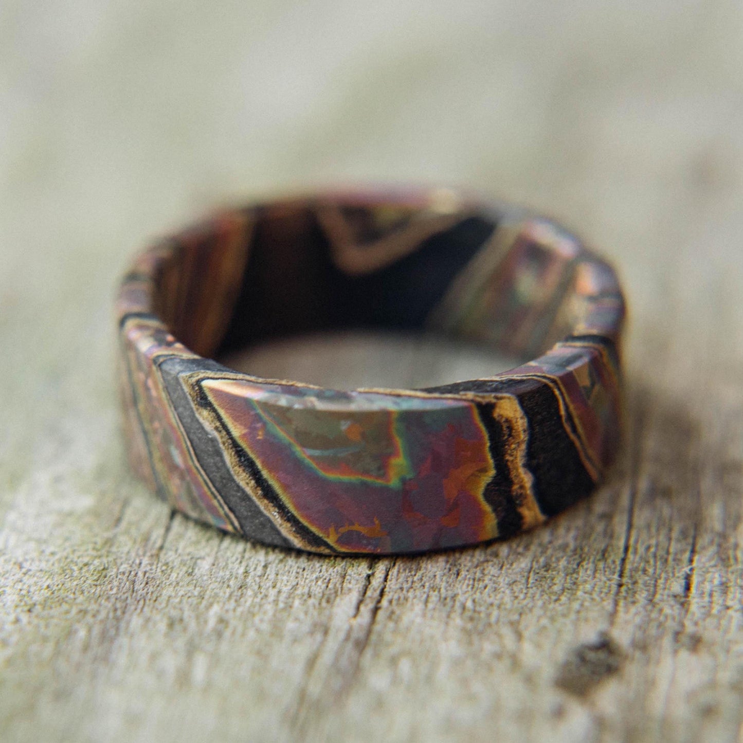 Iridescent Flame Anodized Crystallized Titanium and Zirconium Damascus Wedding Band