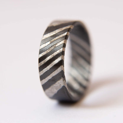 Black Zirconium and Crystallized Titanium Damascus Wedding Band. Black and Silver Ring. (Vertical with white background)