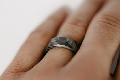 Distressed Black Zirconium and Titanium Damascus Wedding Band. Black and Gray Ring. (Shown on finger)